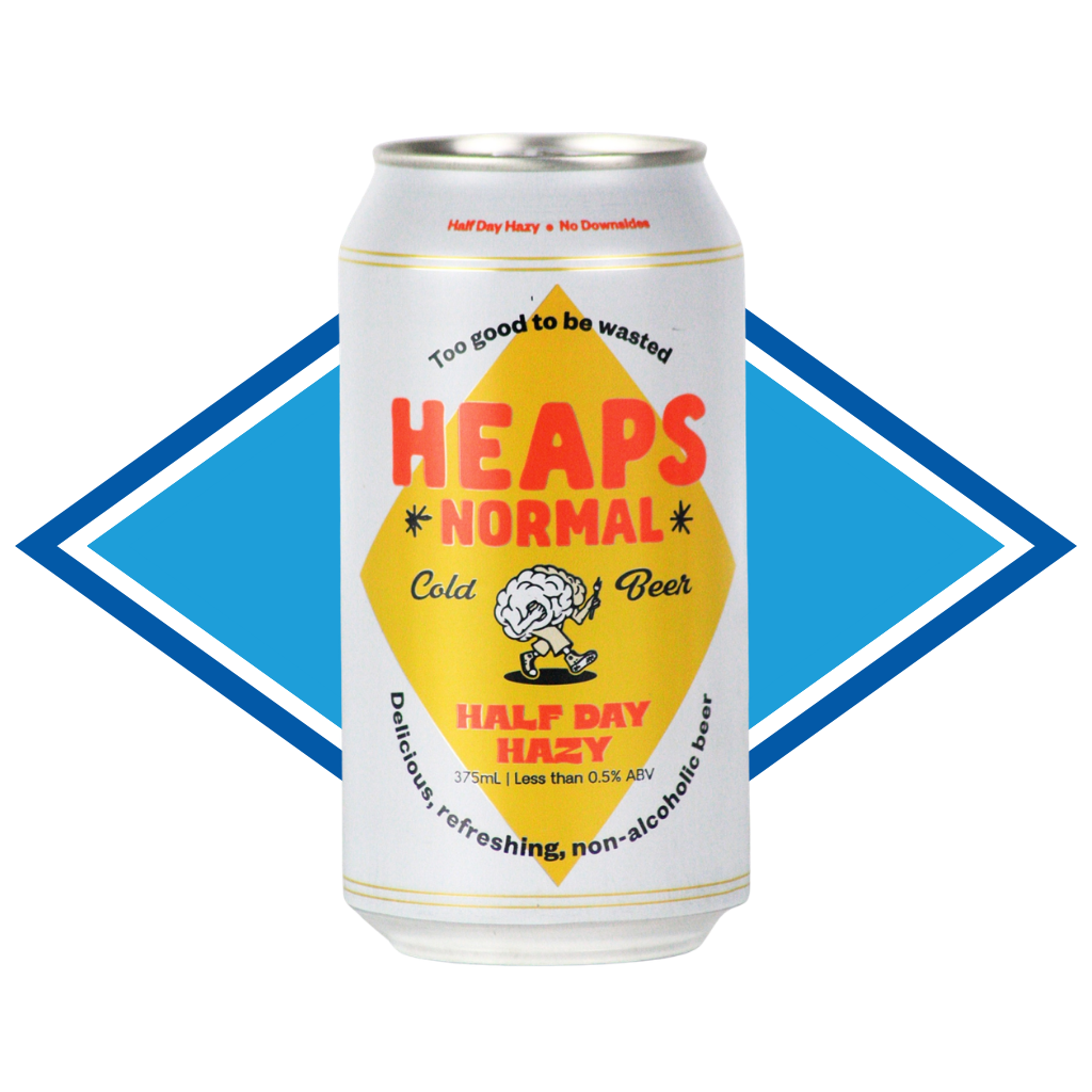Can of Heaps Normal Half Day Hazy in front of the Alcohol Free Drinks Company blue diamond. 