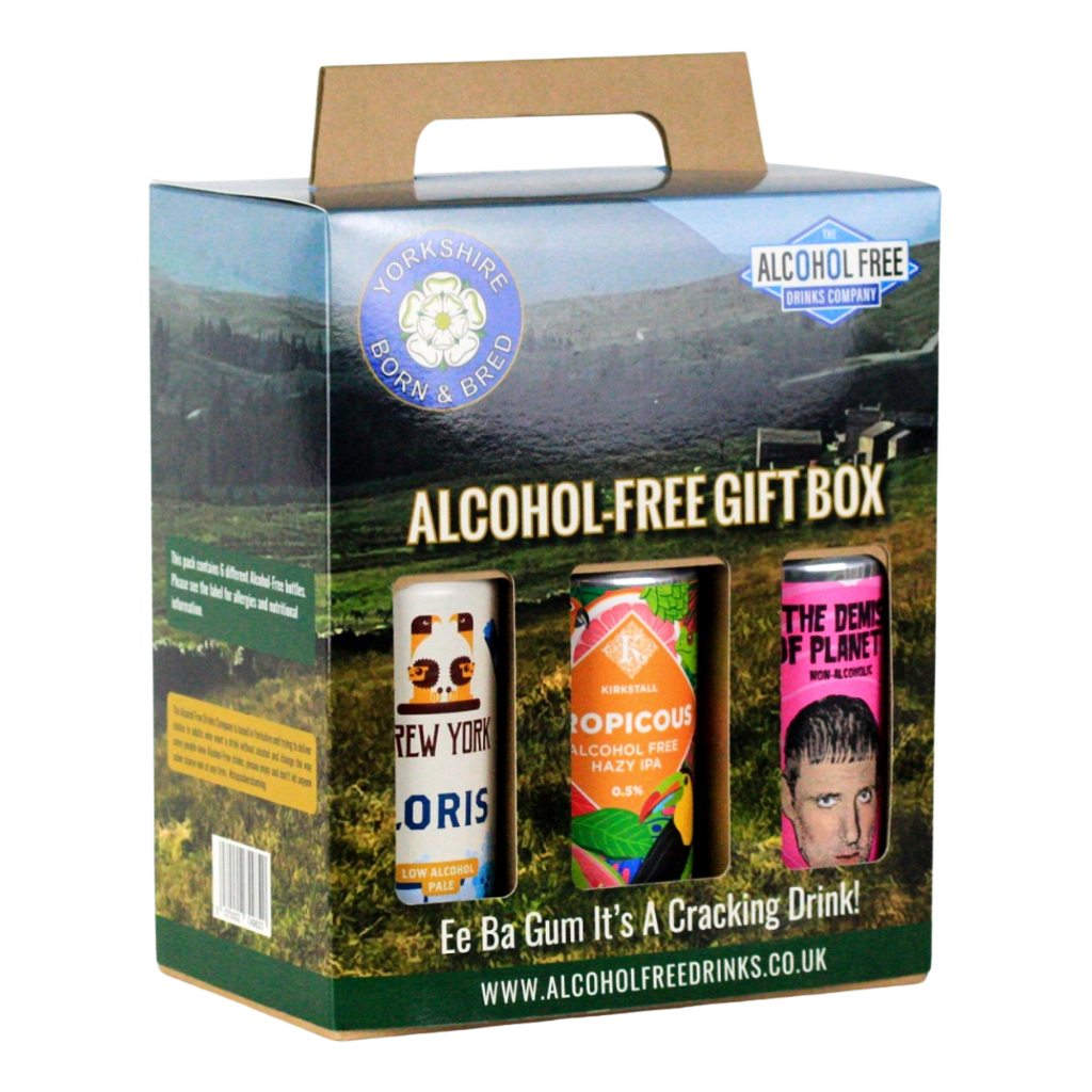 Alcohol-free gift box with three cans on a scenic background